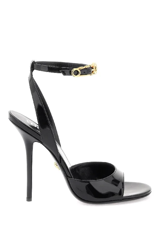 High-heeled sandals for women with cross-strap design and open-toe look for evenings-Versace 'safety pin' patent leather sandals