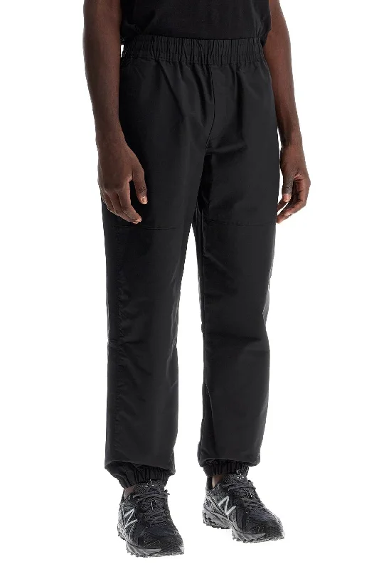 Multi-pocket pants for organized travel convenience -the north face easy wind sport pants