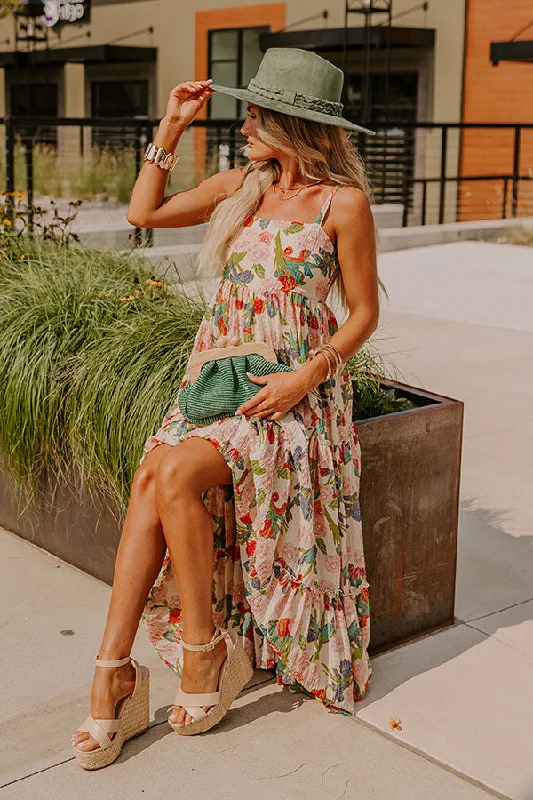 Plus size dresses with asymmetrical hems look modern -Hibiscus Haven Floral Maxi Dress