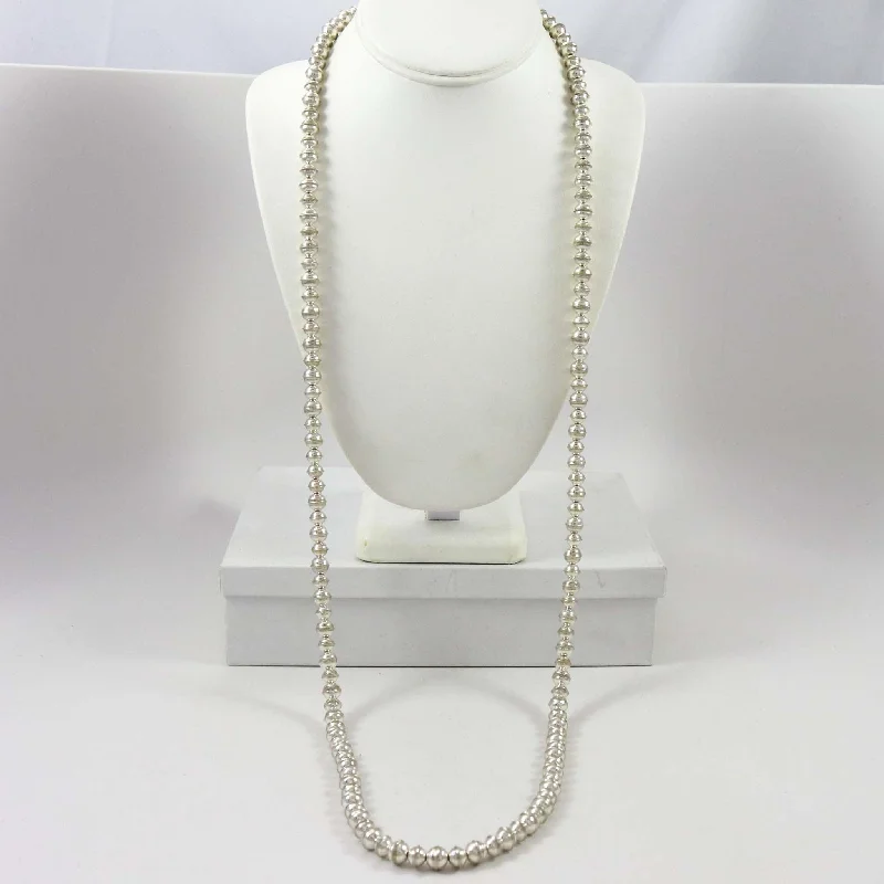 Beautiful necklaces and pendants with moon and star charms for a dreamy effect-Navajo Pearl Necklace