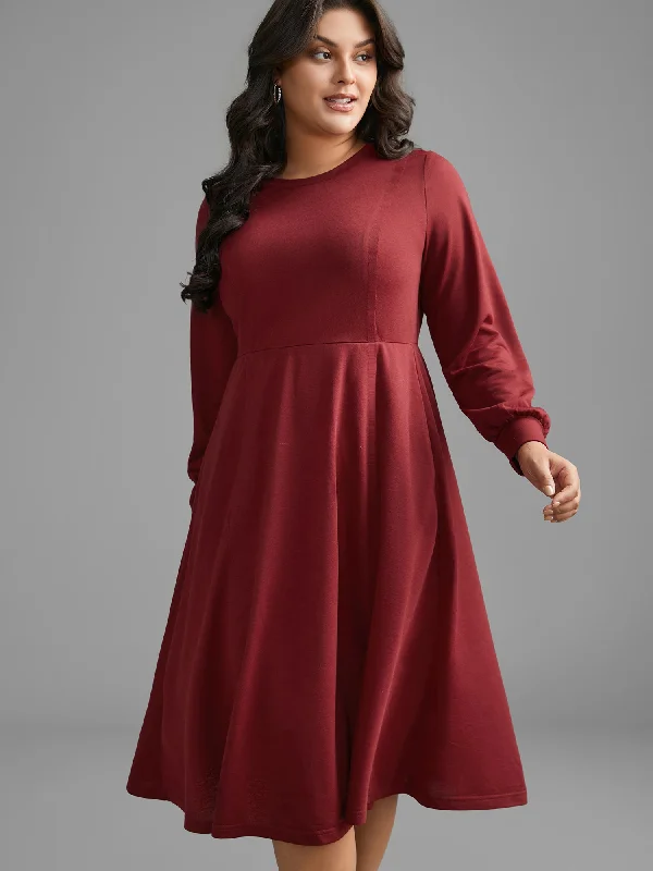 Plus size dresses featuring velvet textures feel plush -Solid Round Neck Midi Knit Dress