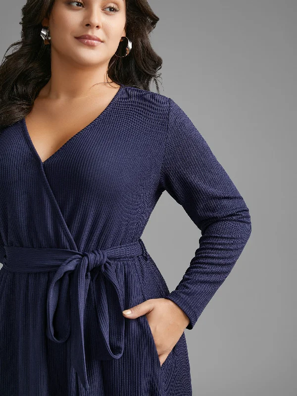 Plus size dresses with midi lengths balance well -Solid Overlap Collar Belted Knit Dress