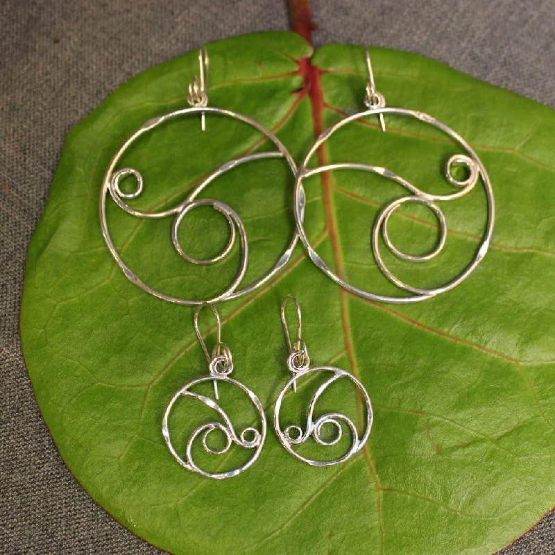 Hoop earrings with twisted metal designs for a dynamic and modern style-Water Sterling Silver Hoops